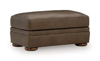 Brown upholstered ottoman with padded top and short legs