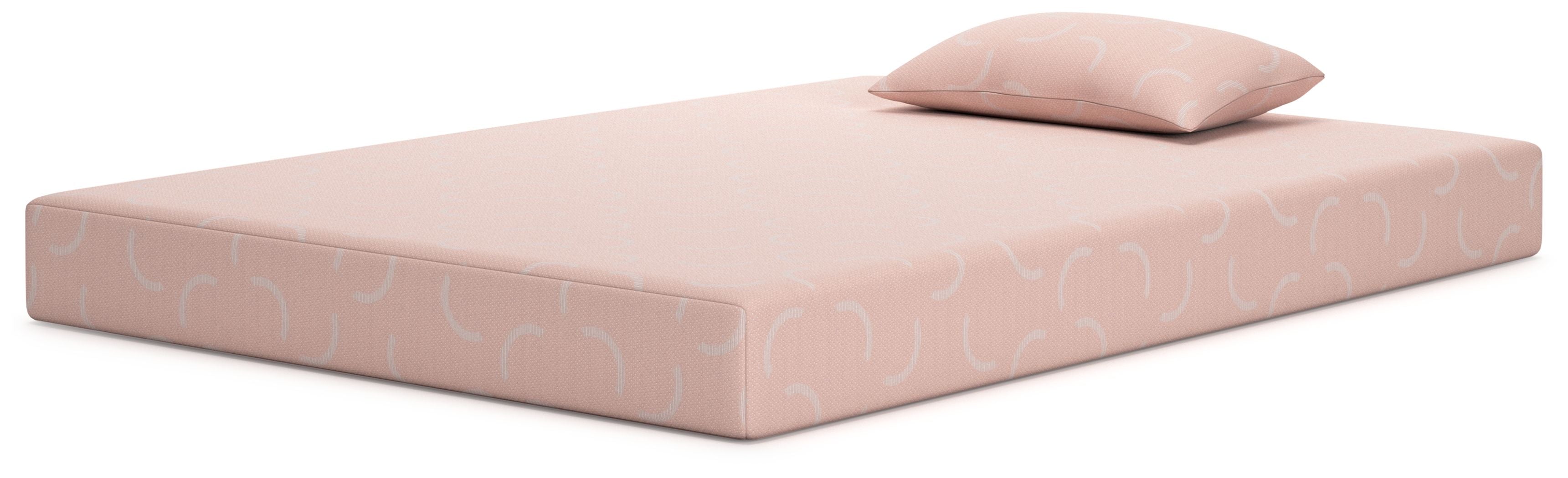 Kids mattress and pillow set, coral-pink top with matching pillow, side view