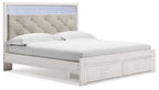 White storage bed with gray tufted headboard and two front drawers
