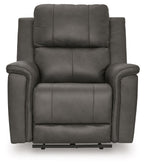 Dark gray power recliner with adjustable headrest, front view, cushioned arms