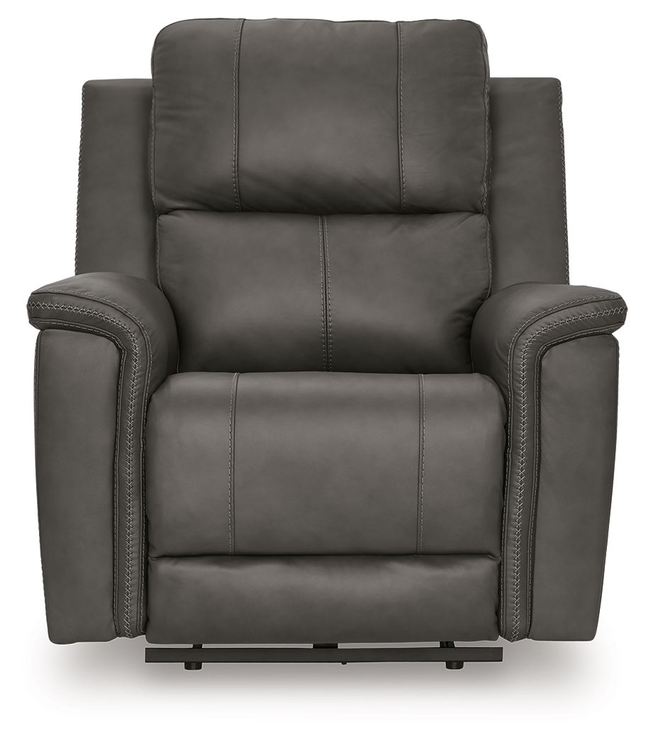 Dark gray power recliner with adjustable headrest, front view, cushioned arms