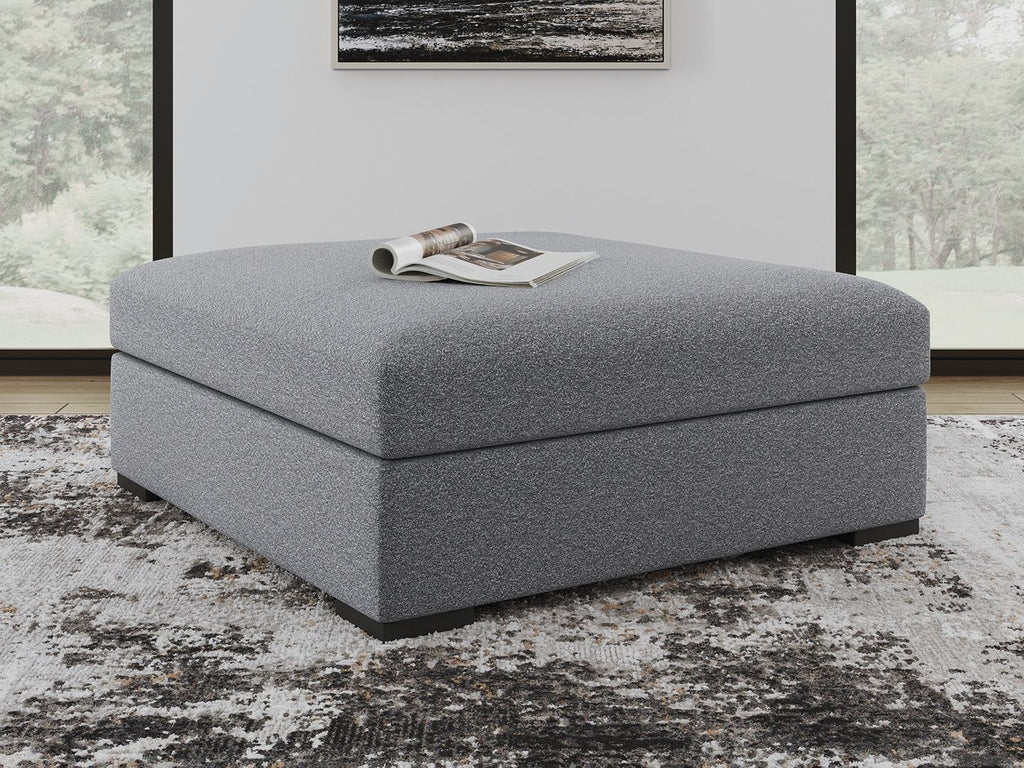 Oversized accent ottoman in salt-and-pepper gray fabric, low cube shape