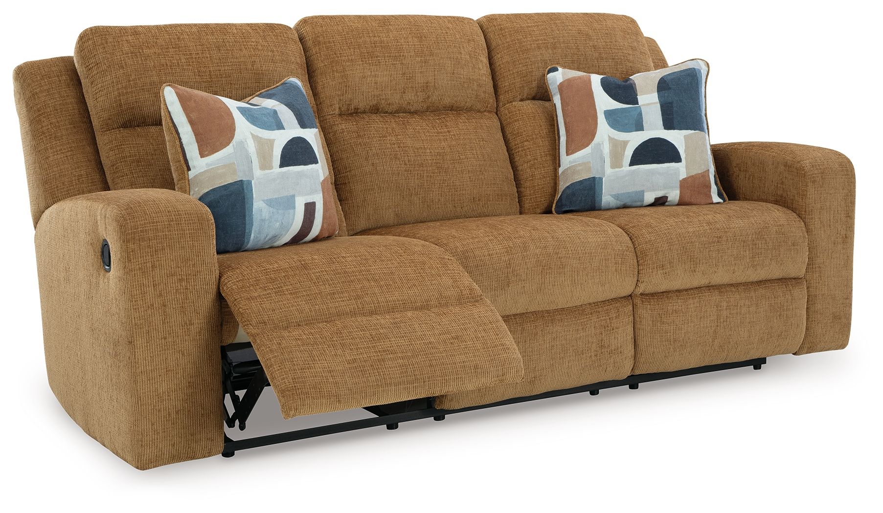 Light brown reclining sofa with one seat reclined and blue patterned throw pillows