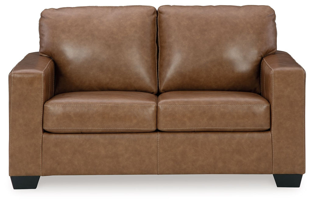 Light brown loveseat with two seat cushions, squared arms, and dark tapered feet