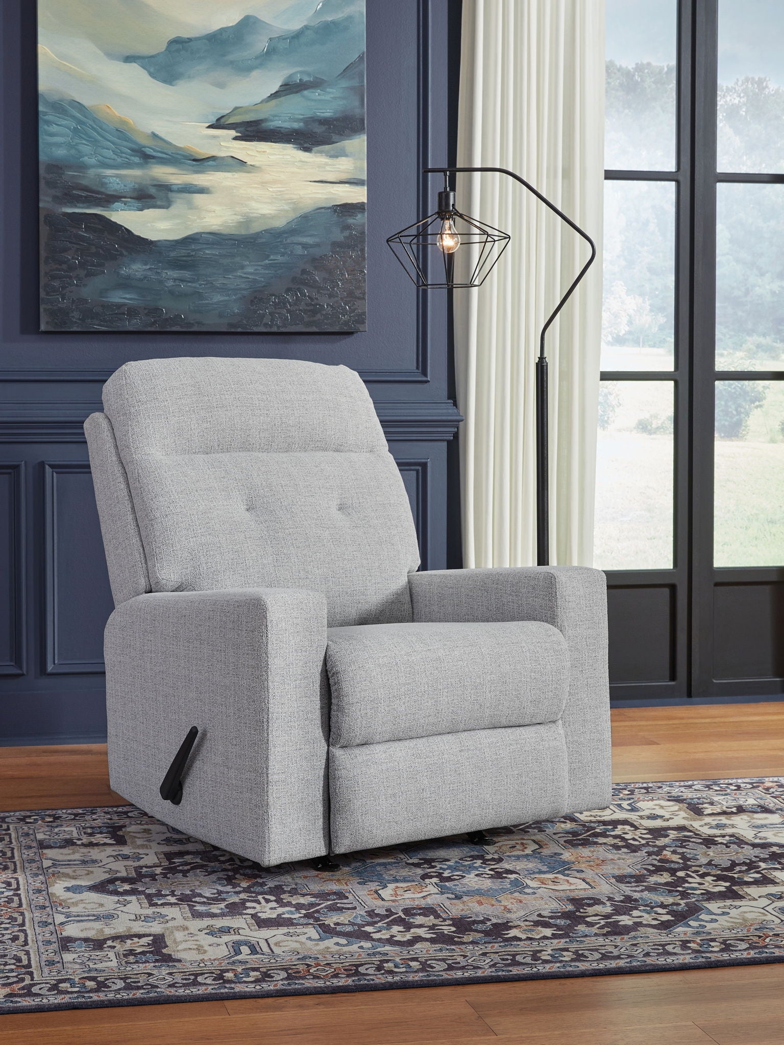 Stone gray fabric recliner chair with tall back and cushioned armrests
