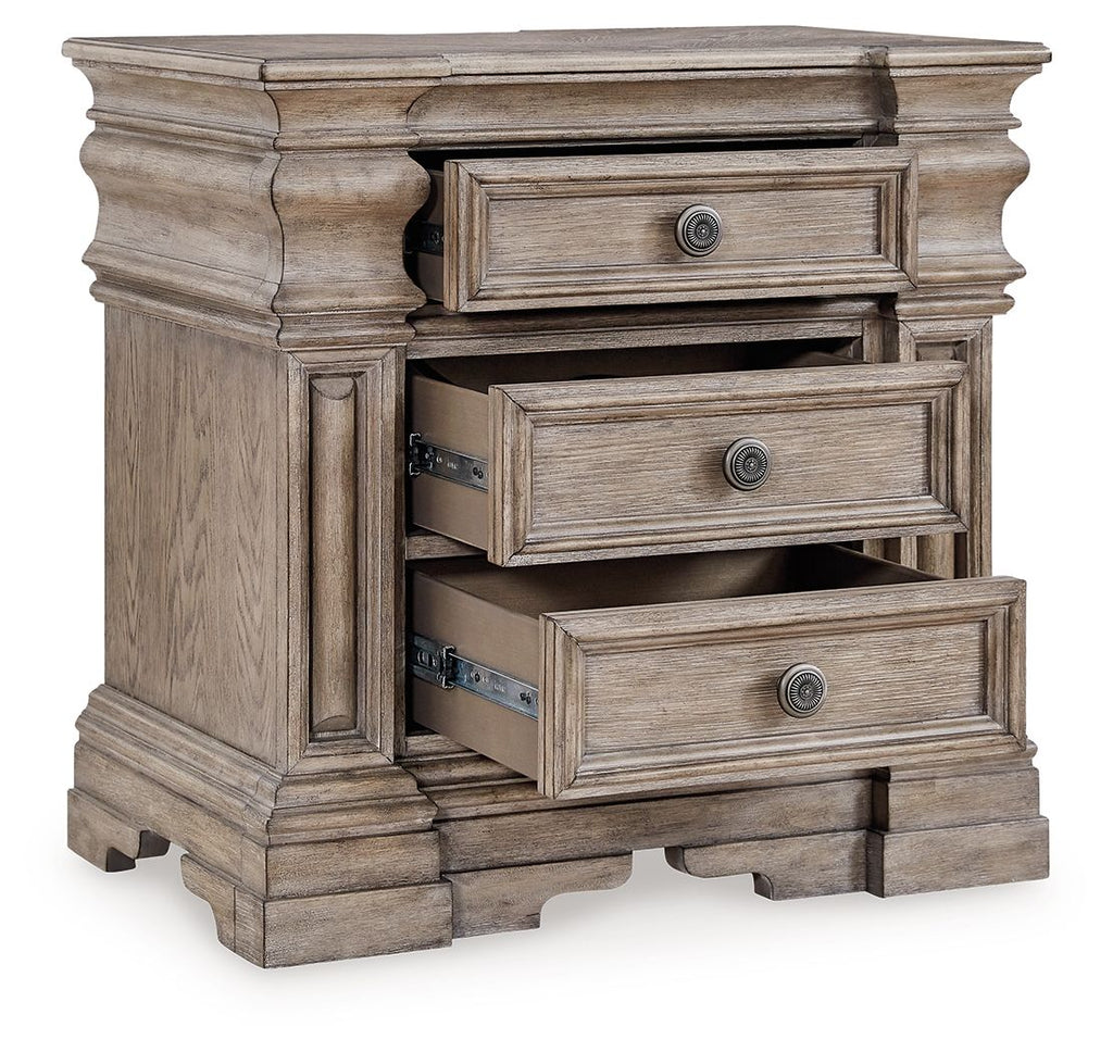 Three-drawer night stand with drawers open, light grayish brown wood and round knobs