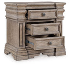 Three-drawer night stand with drawers open, light grayish brown wood and round knobs