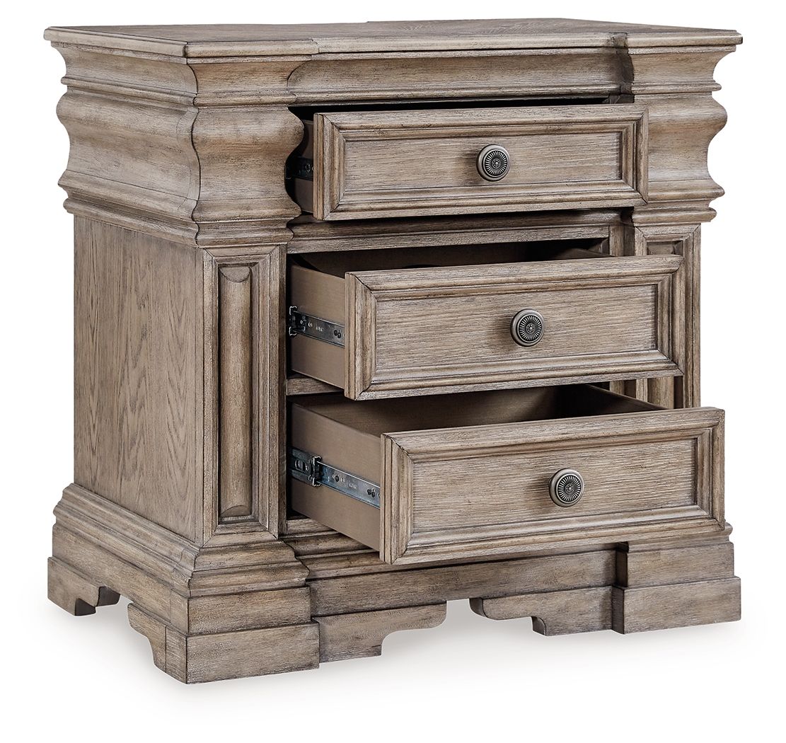 Three-drawer night stand with drawers open, light grayish brown wood and round knobs
