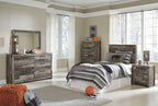 Dark gray bed frame with headboard and striped blanket, gray pillow accents