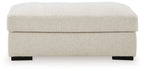 Square light beige linen ottoman with rounded top and dark legs