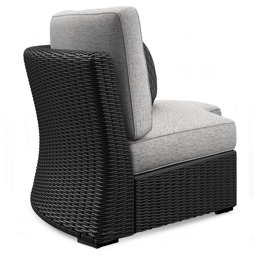 Black woven armchair with light gray seat cushion and tall curved backrest