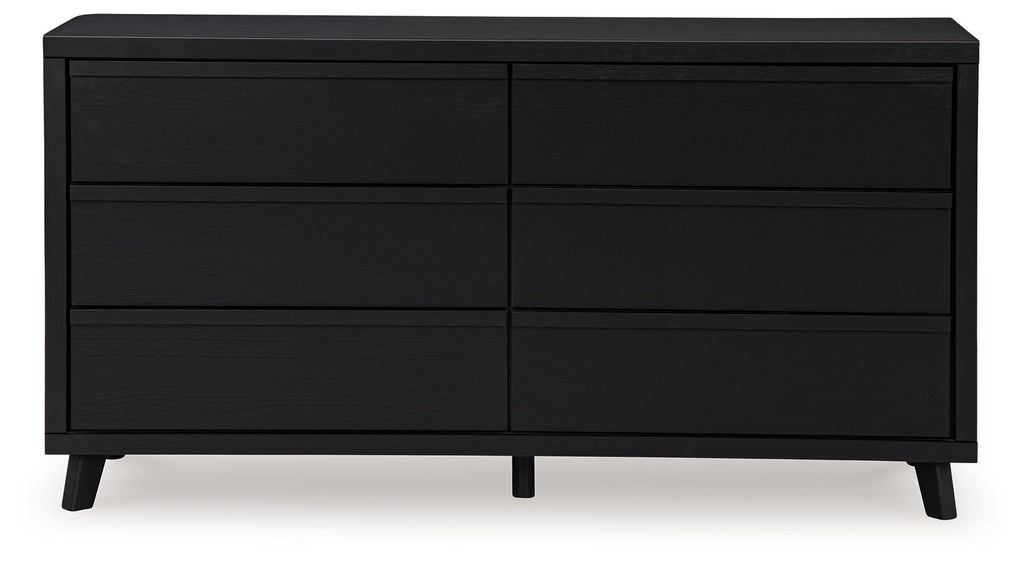 Black six-drawer dresser, front view with six rectangular drawer fronts