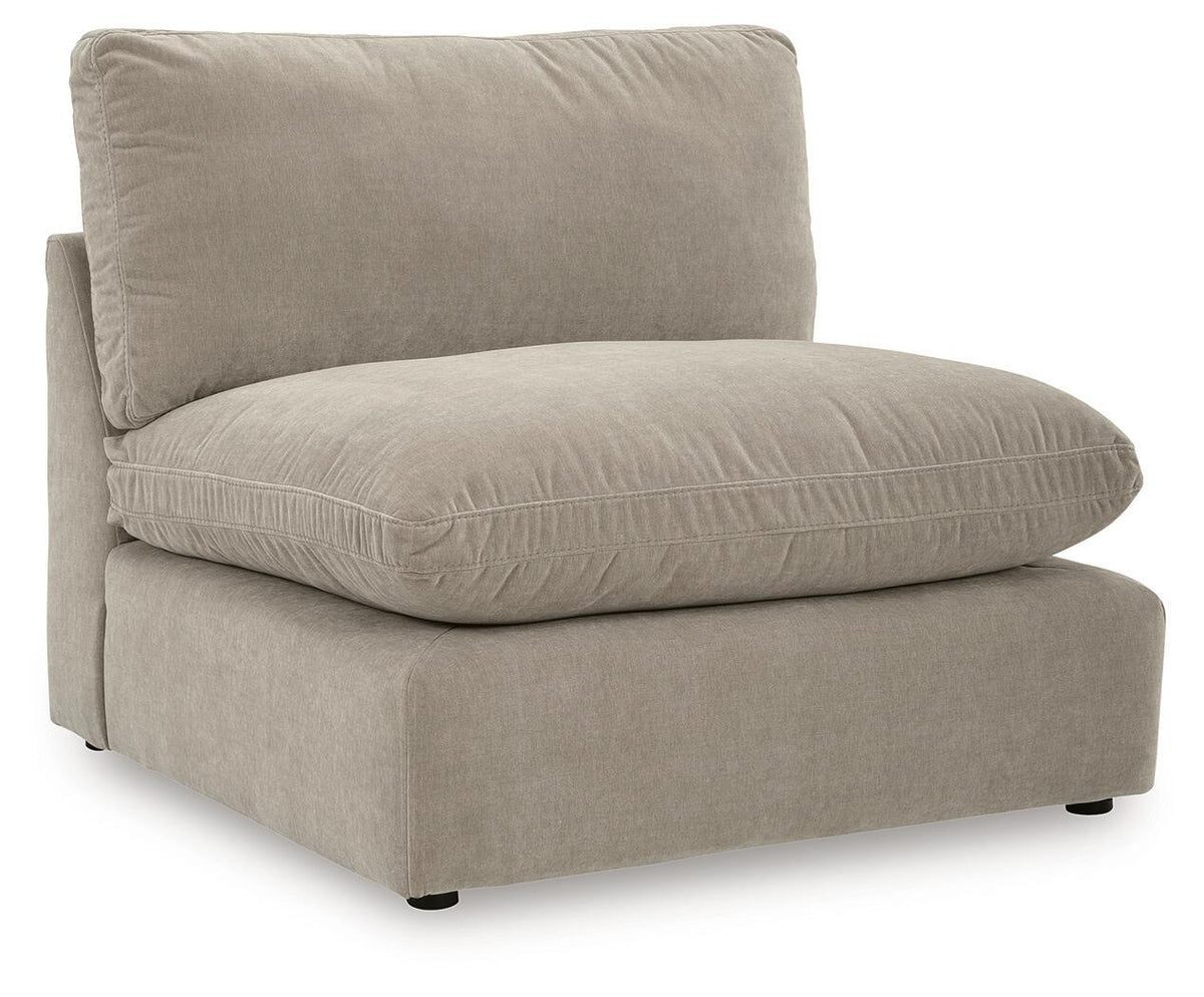 Beige sectional chair with one tall back cushion and rolled seat cushion