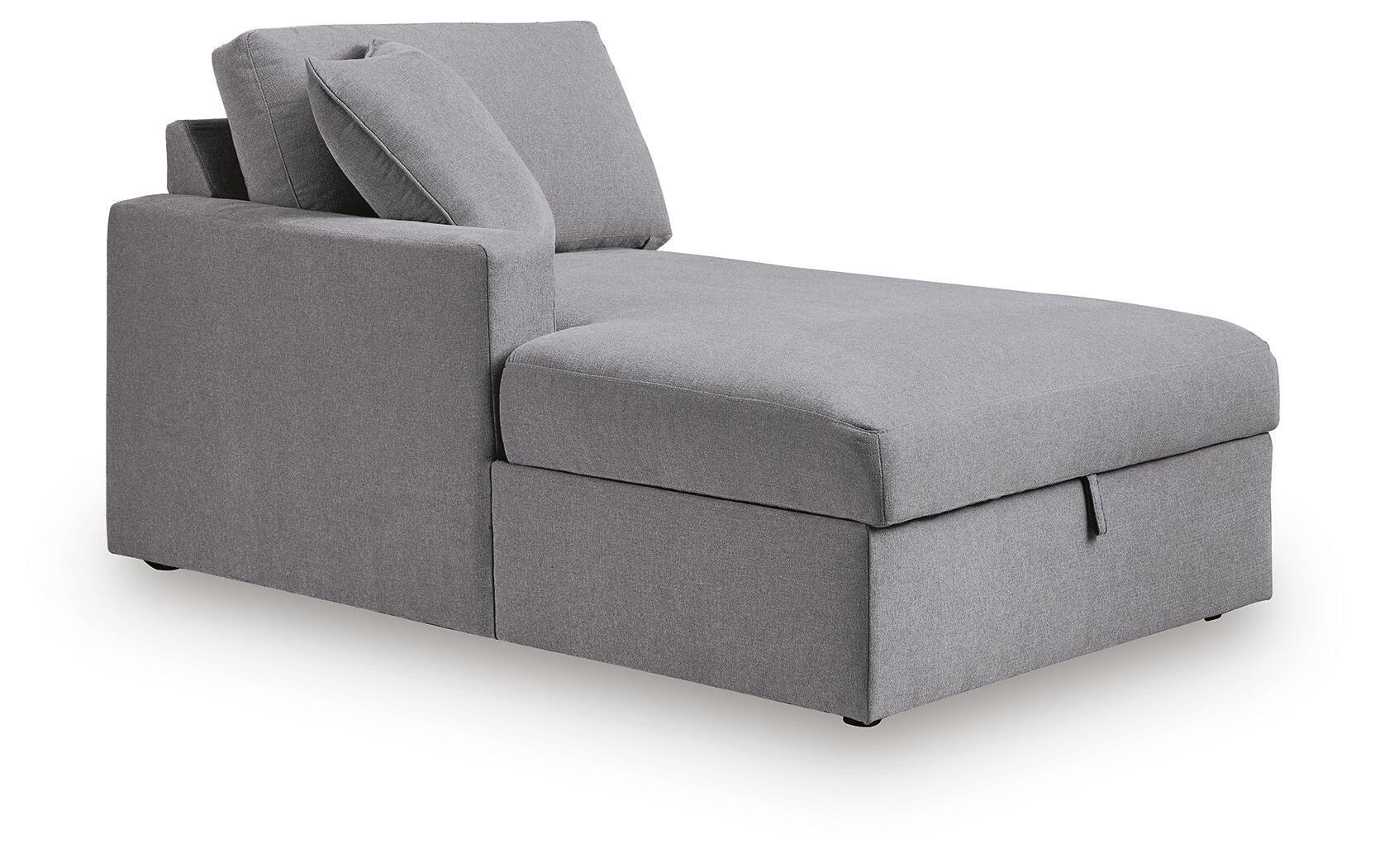 Gray corner chaise with storage, long seat section and tufted seat cushion