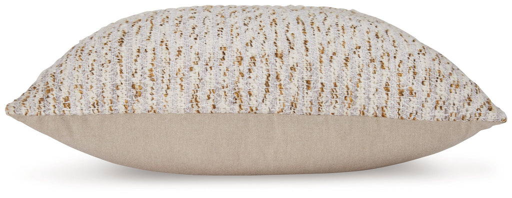 Abler beige textured pillow with solid reverse, shown in side view