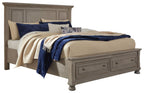 Gray panel storage bed with drawers, upholstered headboard and side rails