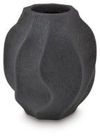 Black textured vase with asymmetrical fluted panels and round opening