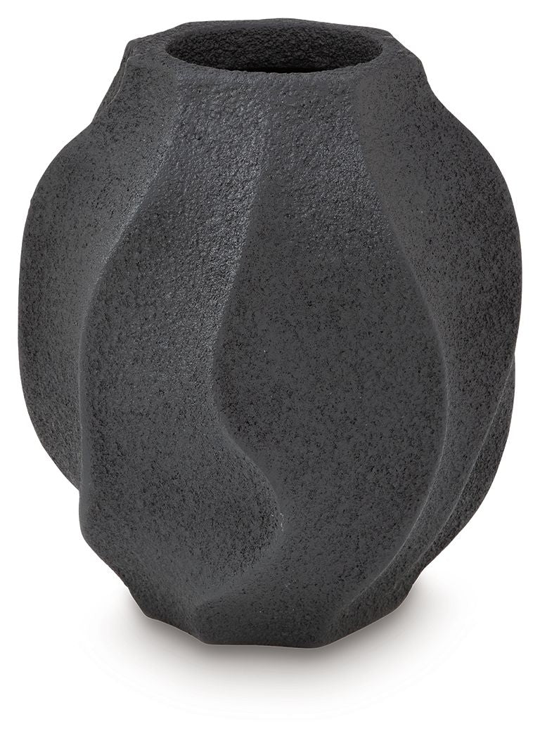 Black textured vase with asymmetrical fluted panels and round opening