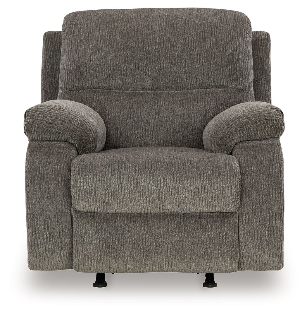 Dark gray rocker recliner chair with wide padded arms and recline-ready seat