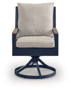 Blue swivel chair with beige seat cushion and tall backrest pillow