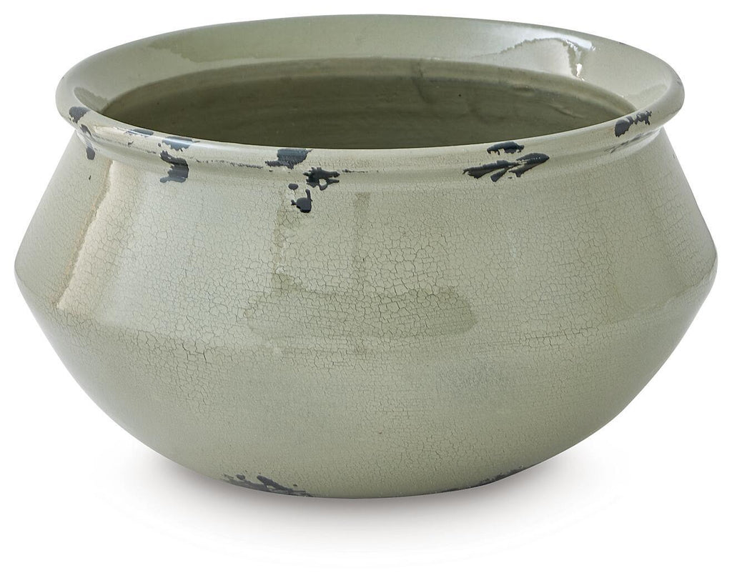 Round sage ceramic bowl with crackle glaze and black silhouette accents