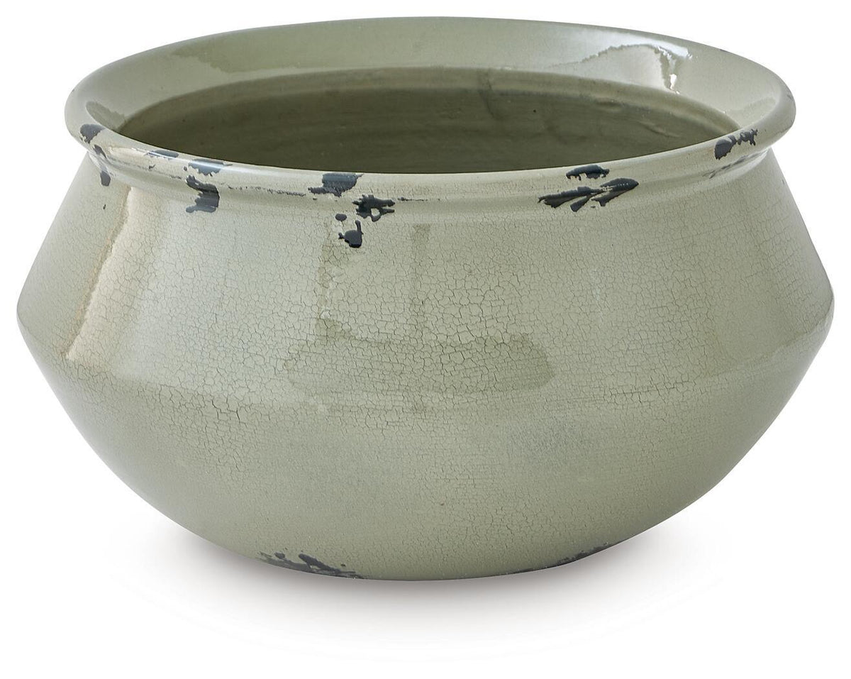 Round sage ceramic bowl with crackle glaze and black silhouette accents