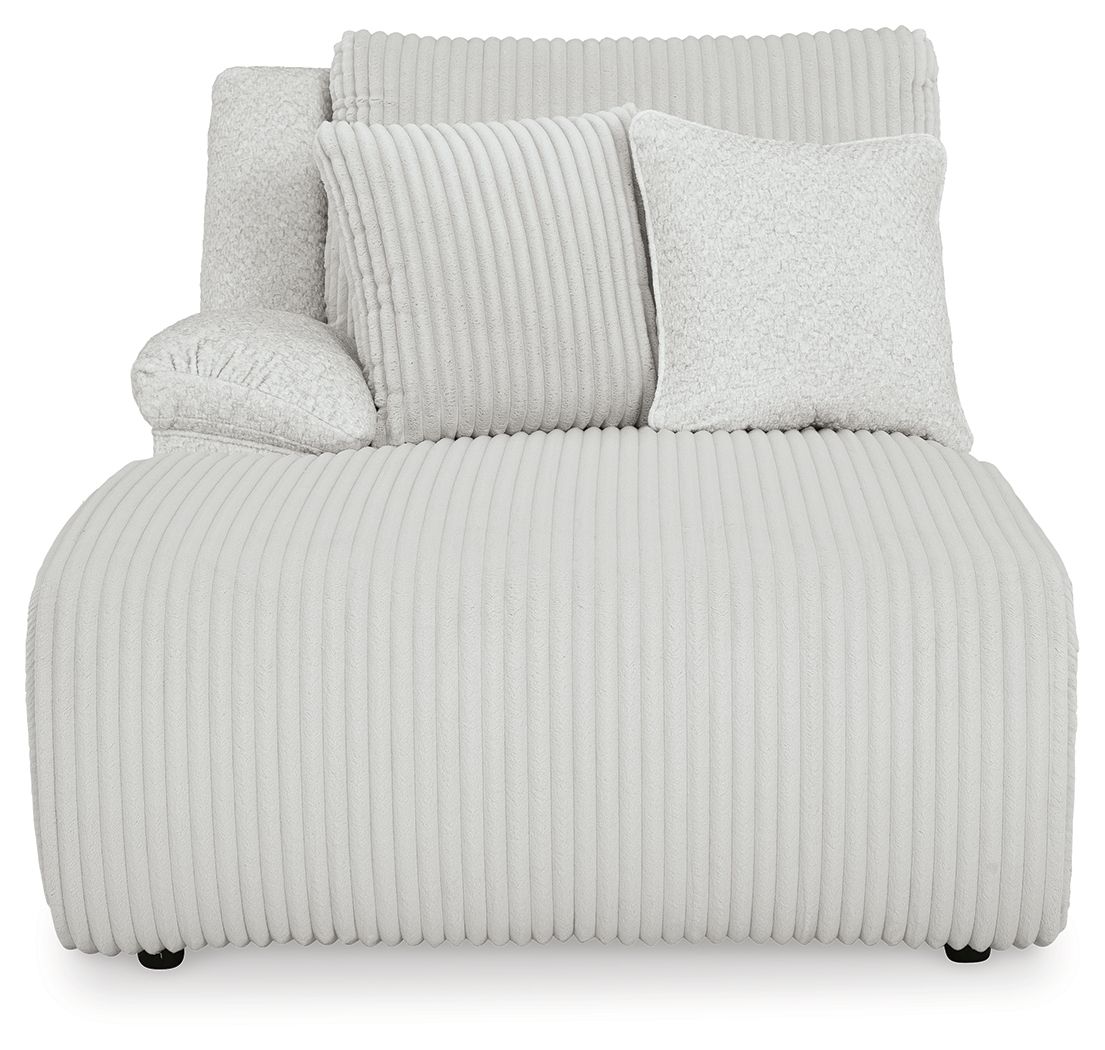 Press-back chaise seat with light-gray ribbed upholstery and back bolster pillows