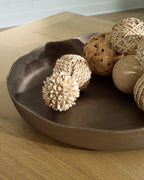 Champagne gold oval tray with rope and woven decor items