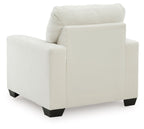 Upholstered armchair with striped fabric, rounded back, wide arms, and dark block feet.
