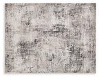 Dark gray abstract area rug with distressed pattern, flat weave look