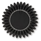 Round accent mirror back with dark metal petal rim and hanging loop