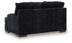 Dark charcoal loveseat with plush back cushions and track-style arms