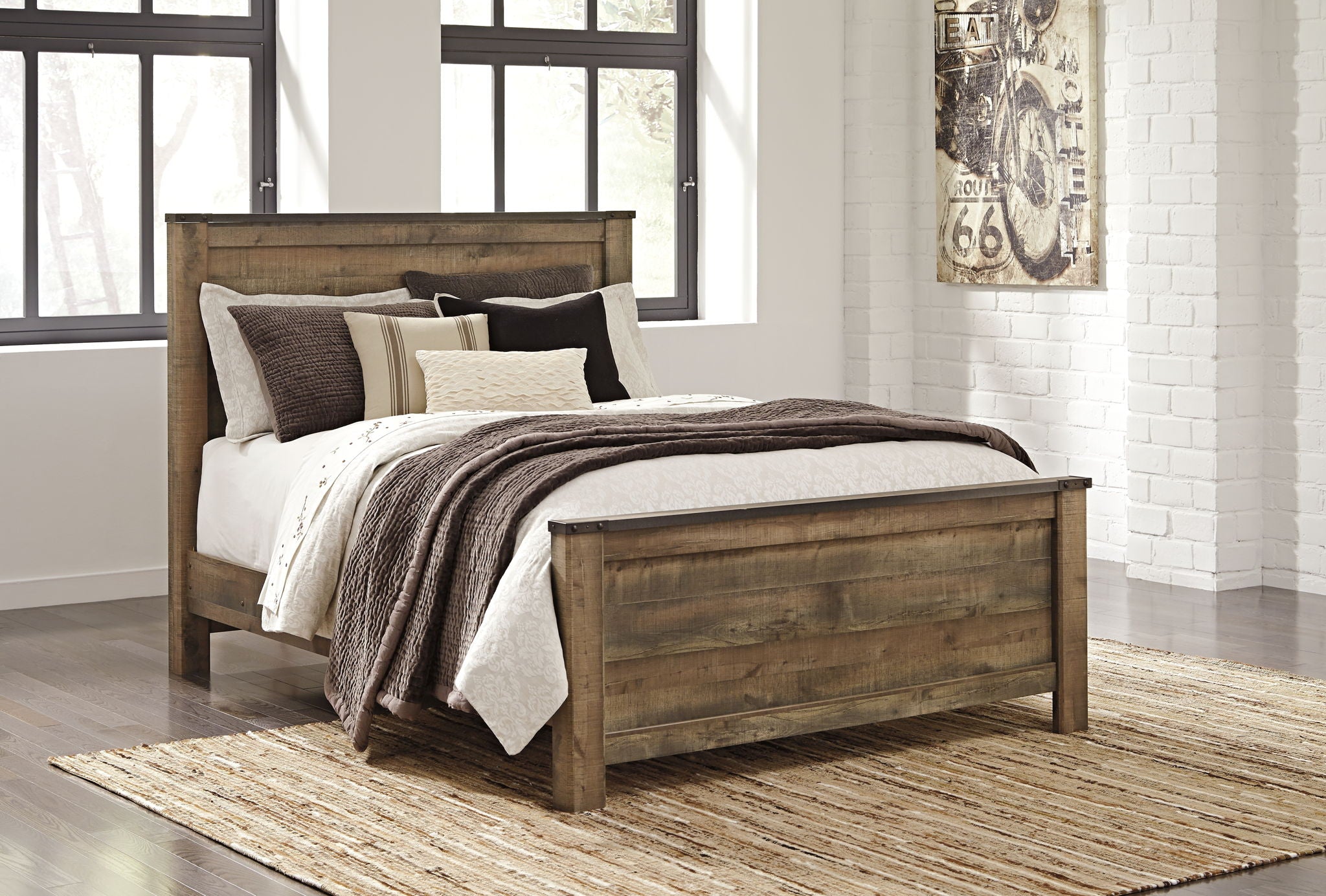 Dark brown panel bed with square panel headboard, styled with neutral bedding