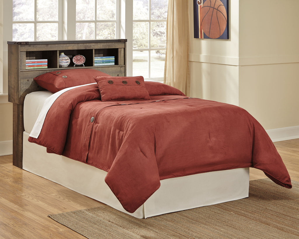 Youth bookcase headboard with dark brown shelves, red quilt and pillow