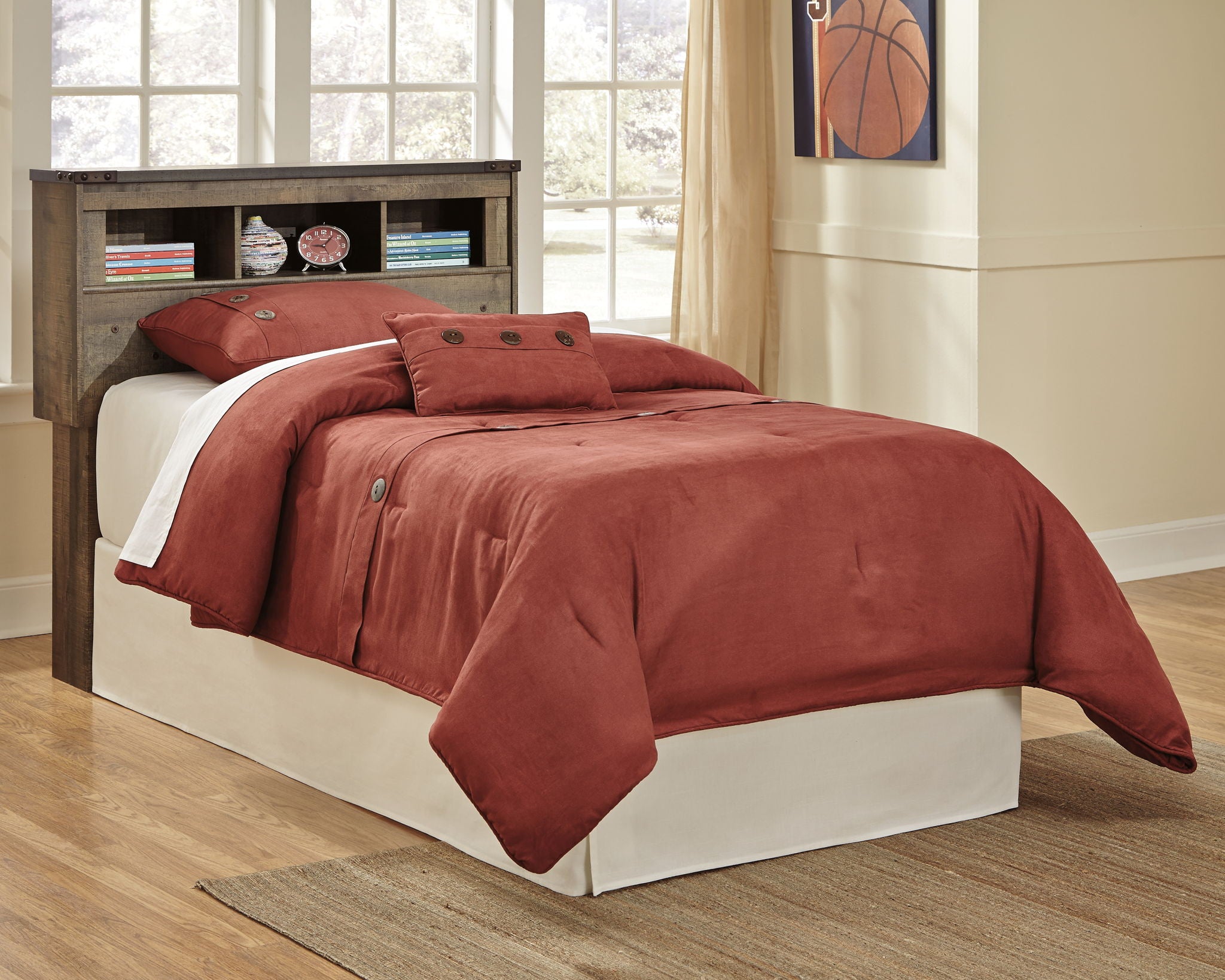 Youth bookcase headboard with dark brown shelves, red quilt and pillow