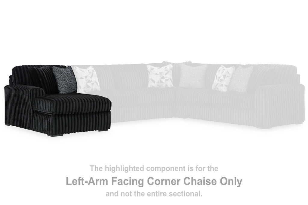 Left-arm corner chaise section with onyx ribbed upholstery and low ottoman back