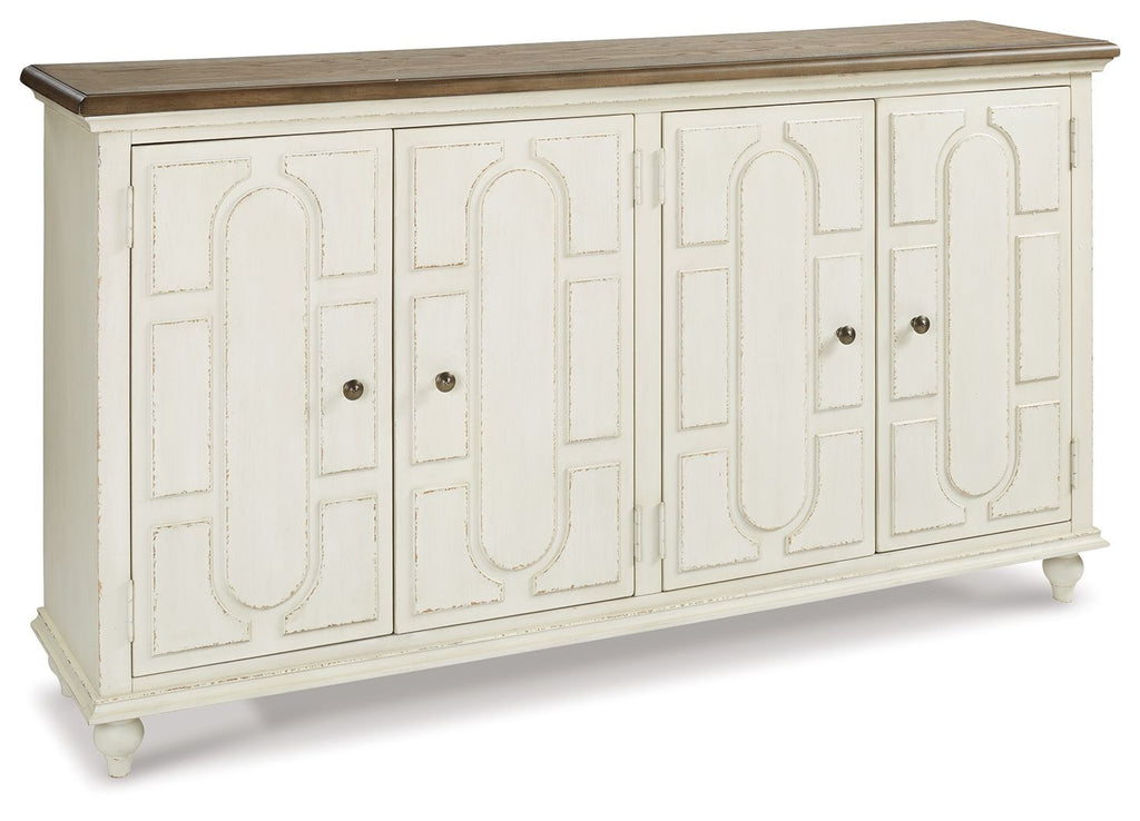 Antique white accent cabinet with carved door panels and round knobs