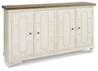Antique white accent cabinet with carved door panels and round knobs