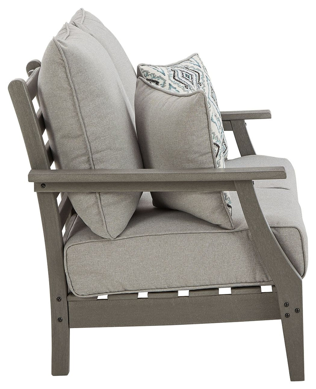 Gray upholstered loveseat with back cushions and a diamond-pattern throw pillow on the arm.