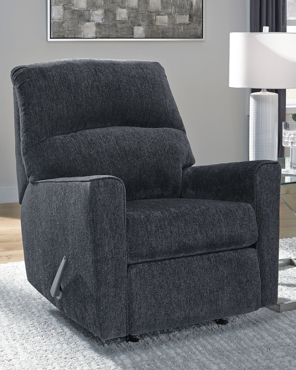 Altari slate rocker recliner with thick seat cushion, padded arms and dark fabric upholstery