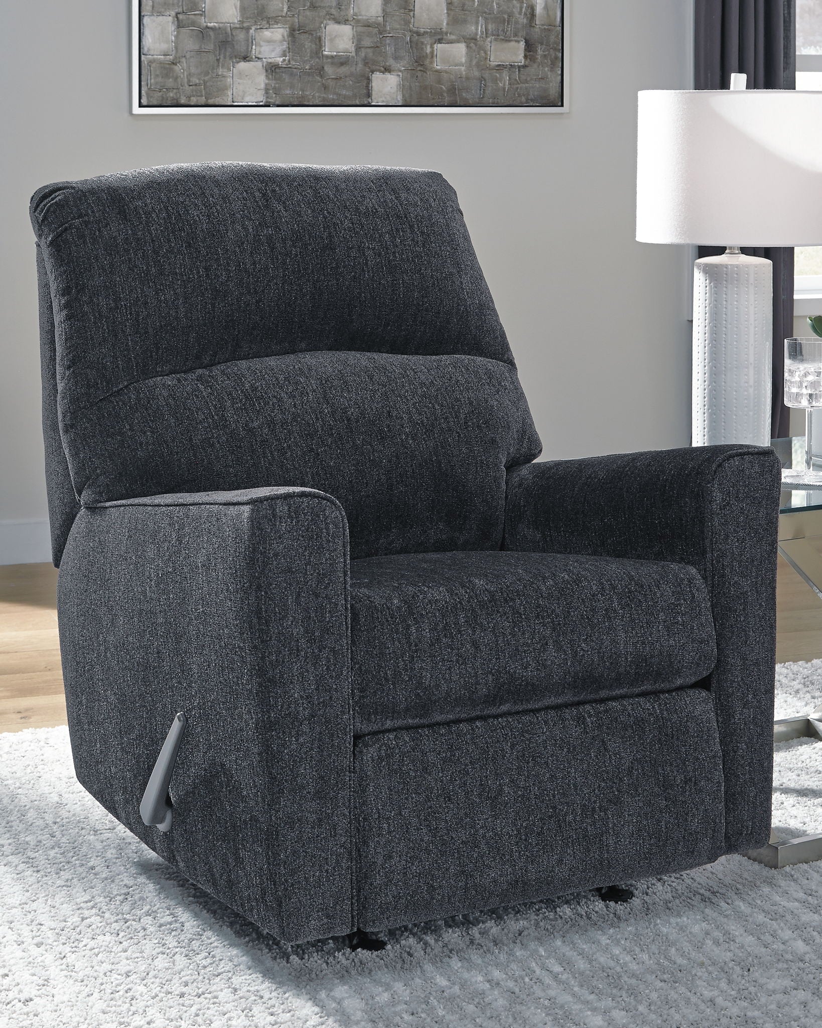 Altari slate rocker recliner with thick seat cushion, padded arms and dark fabric upholstery