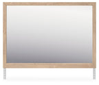Tan wood bedroom mirror with wide beveled rectangular frame and reflective glass