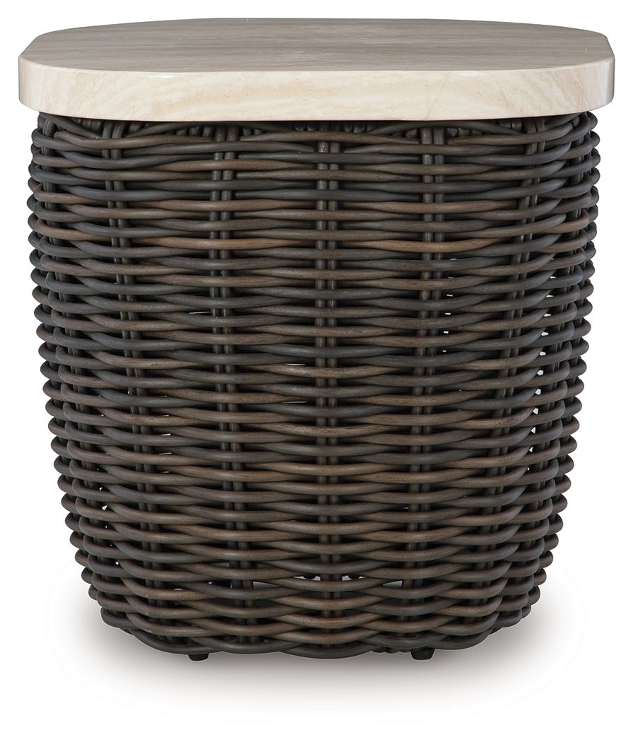 Dark brown wicker side table with round beige tabletop and raised edge