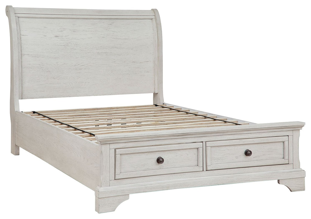 White sleigh bed with slatted base and two storage drawers, open headboard