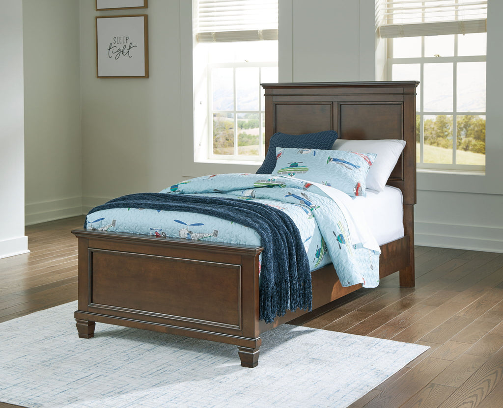 Dark brown panel bed with two front drawers and upholstered headboard