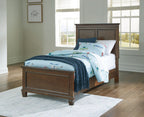 Dark brown panel bed with two front drawers and upholstered headboard
