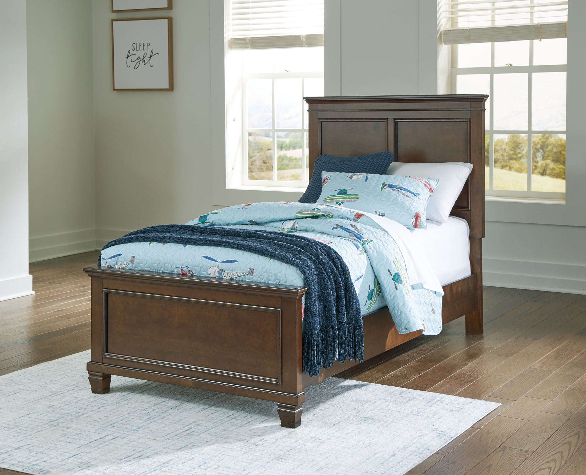 Dark brown panel bed with two front drawers and upholstered headboard