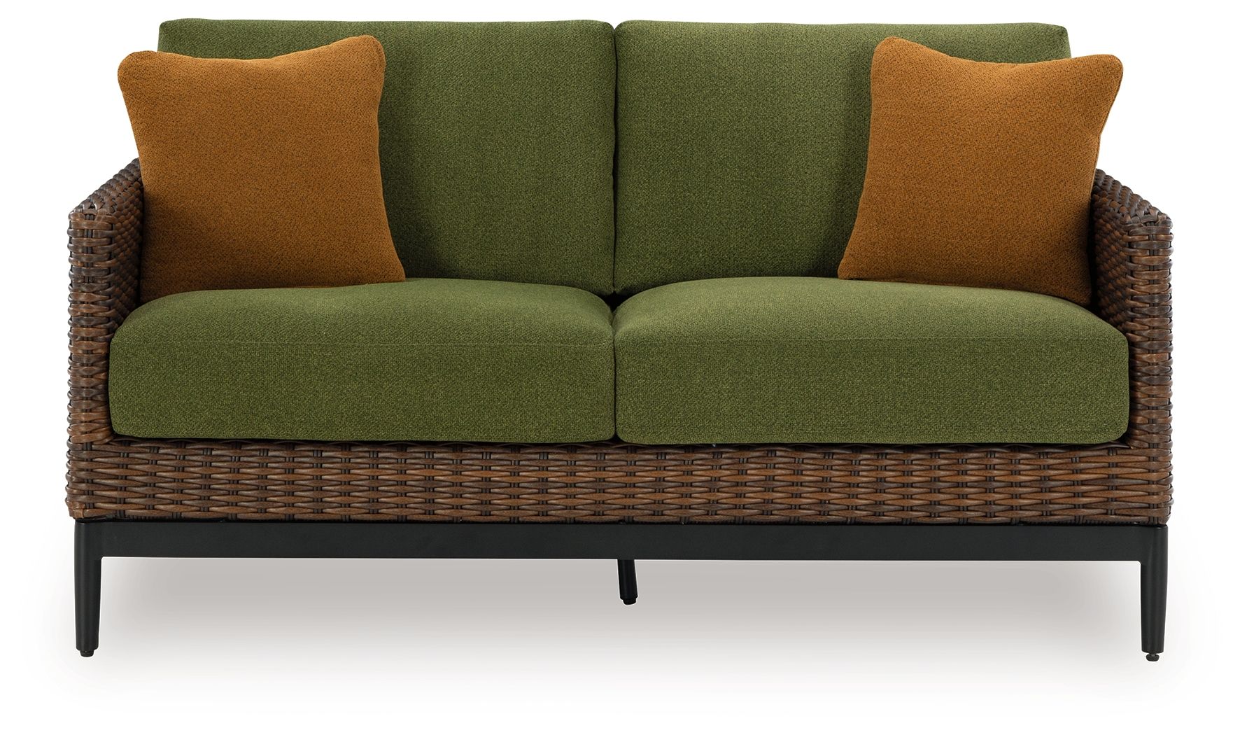 Outdoor loveseat with green seat cushions, brown woven base, and orange-brown back pillows