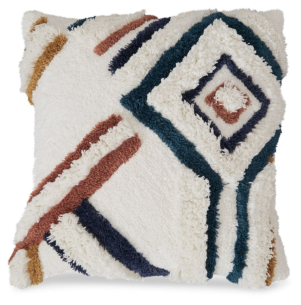 Evermore pillow cover with fuzzy white front and geometric embroidery in dark blue and rust