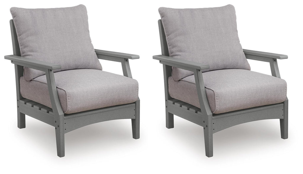 Set of 2 gray lounge chairs with padded cushions, slatted arms, and sturdy frames